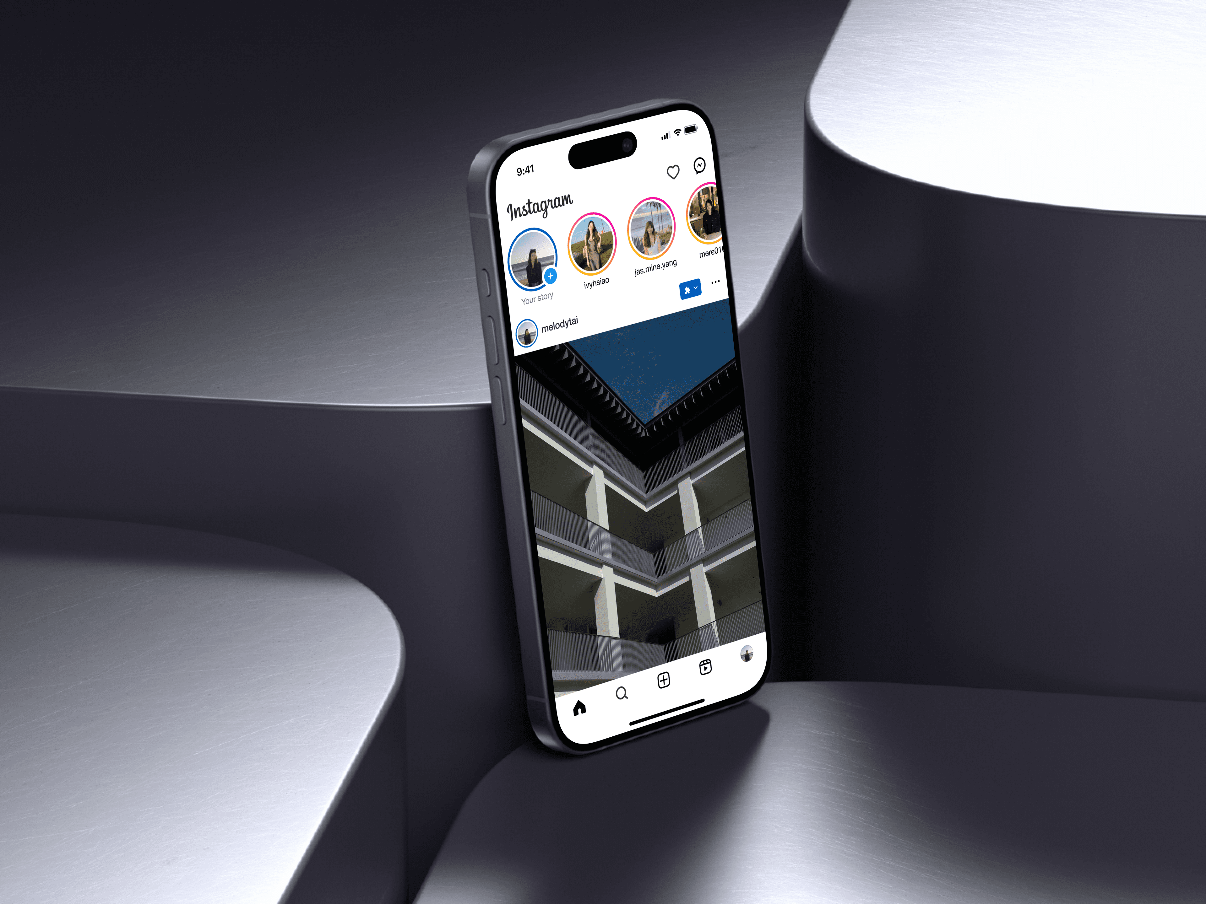 Instagram redesign on an iPhone 15 Pro against sculpted silver surfaces